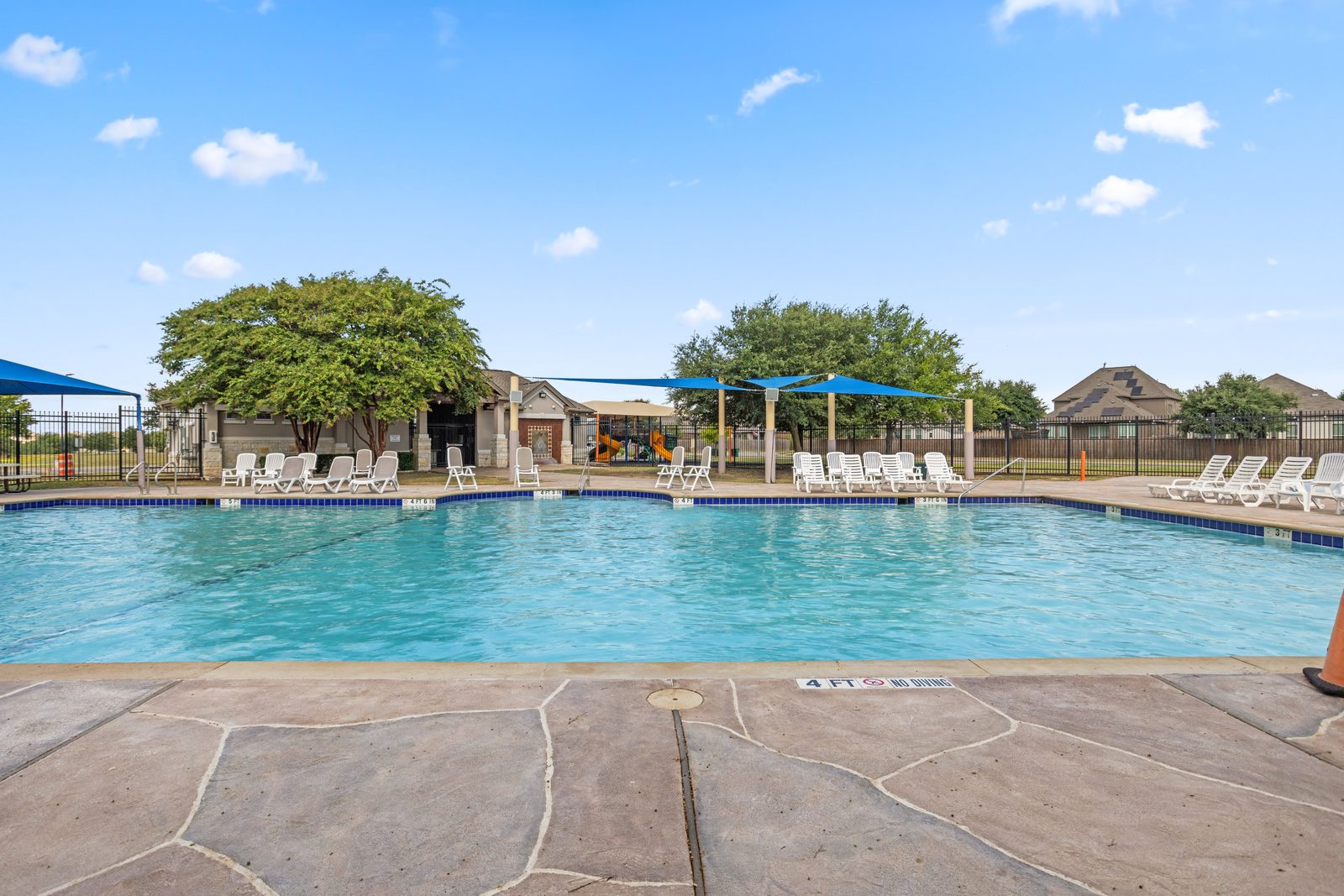 Community Pool — vacant two-story home, Austin TX real estate photography