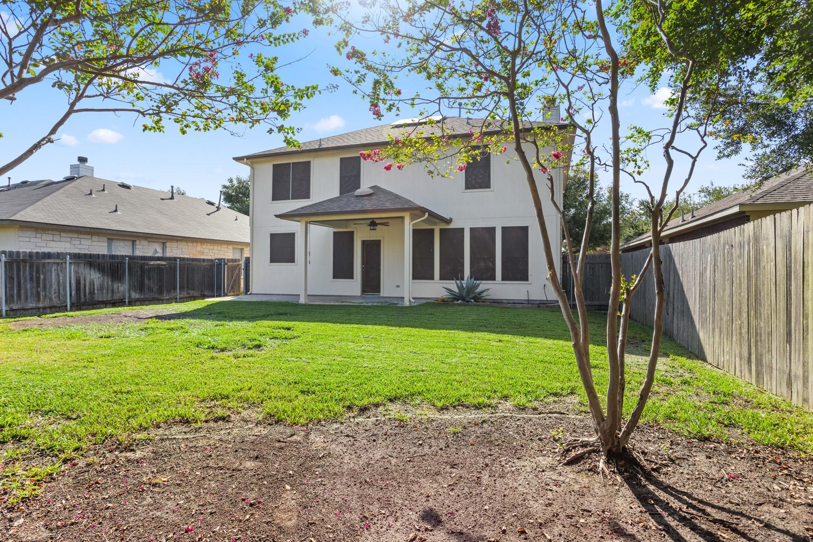 Backyard — vacant two-story home, Austin TX real estate photography