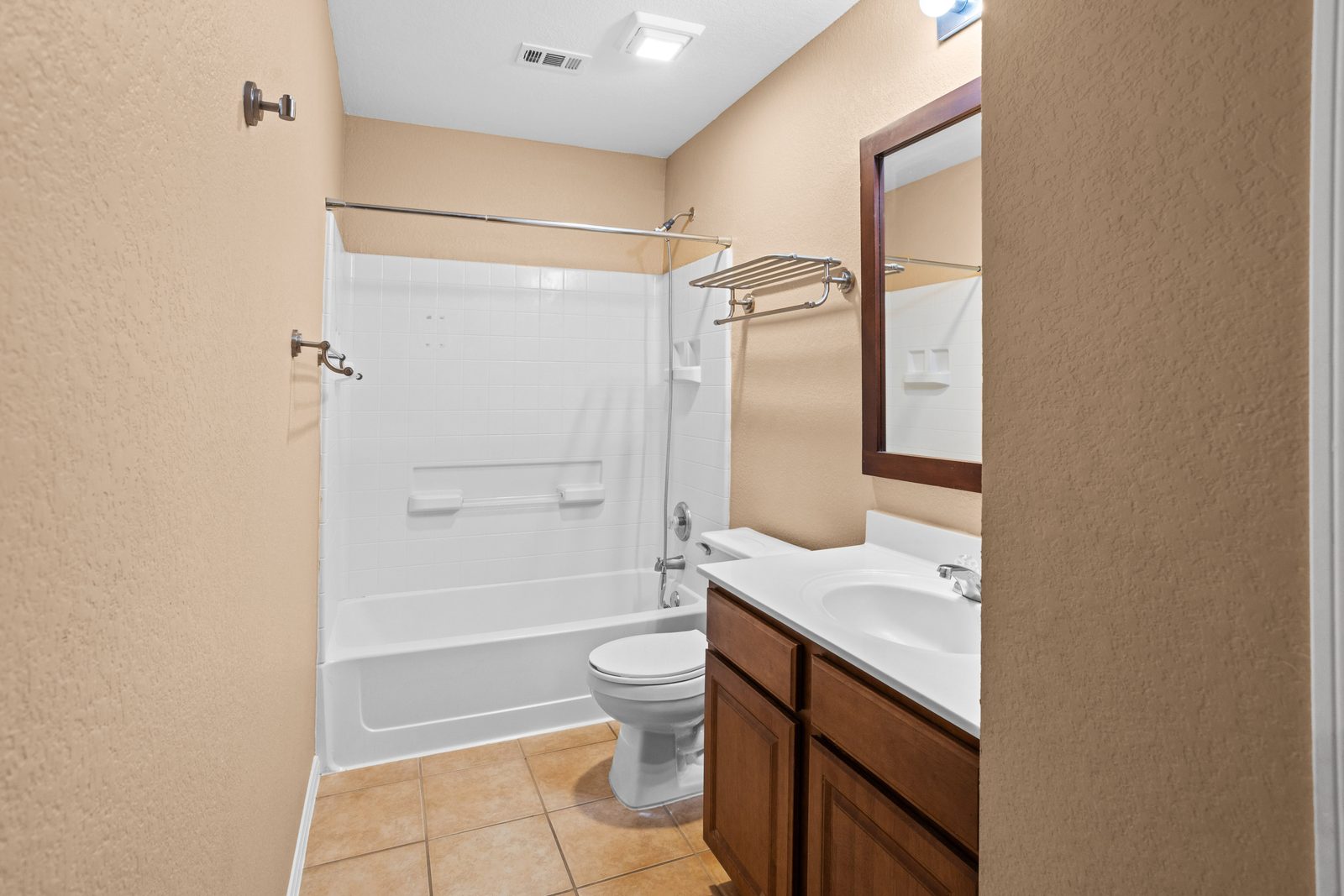 Hall Bath — vacant two-story home, Austin TX real estate photography