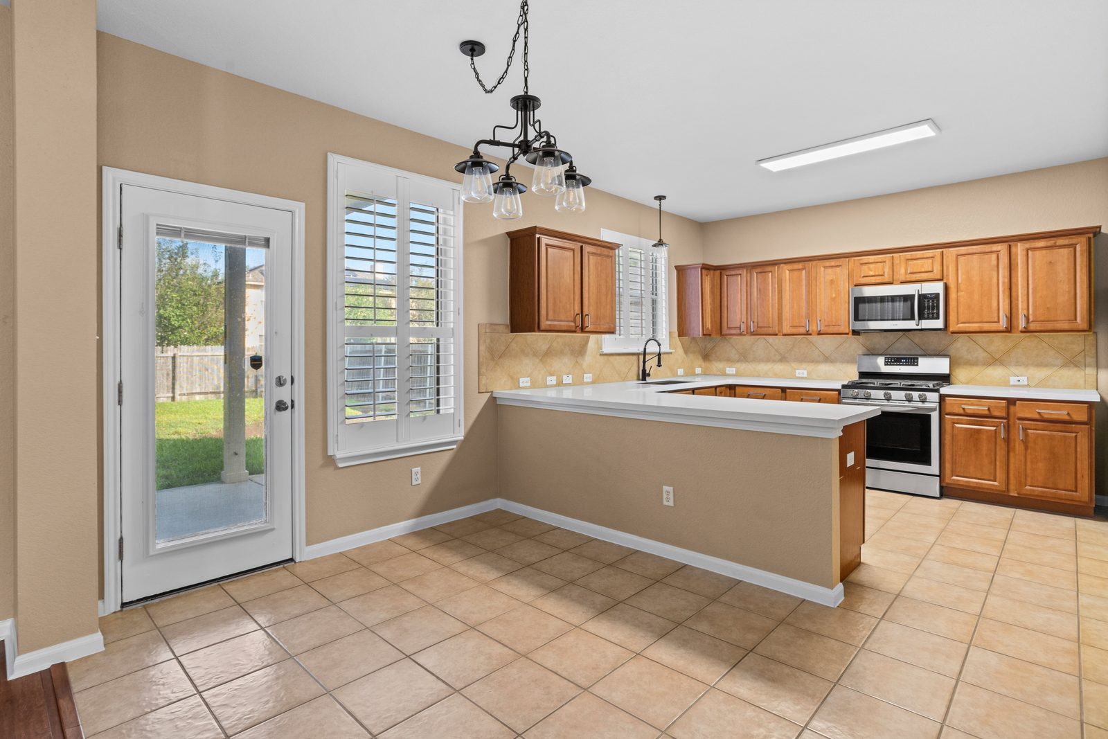 Kitchen — vacant two-story home, Austin TX real estate photography