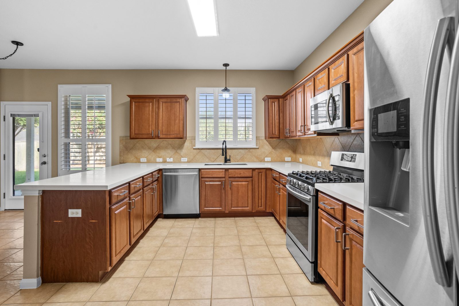 Kitchen — vacant two-story home, Austin TX real estate photography