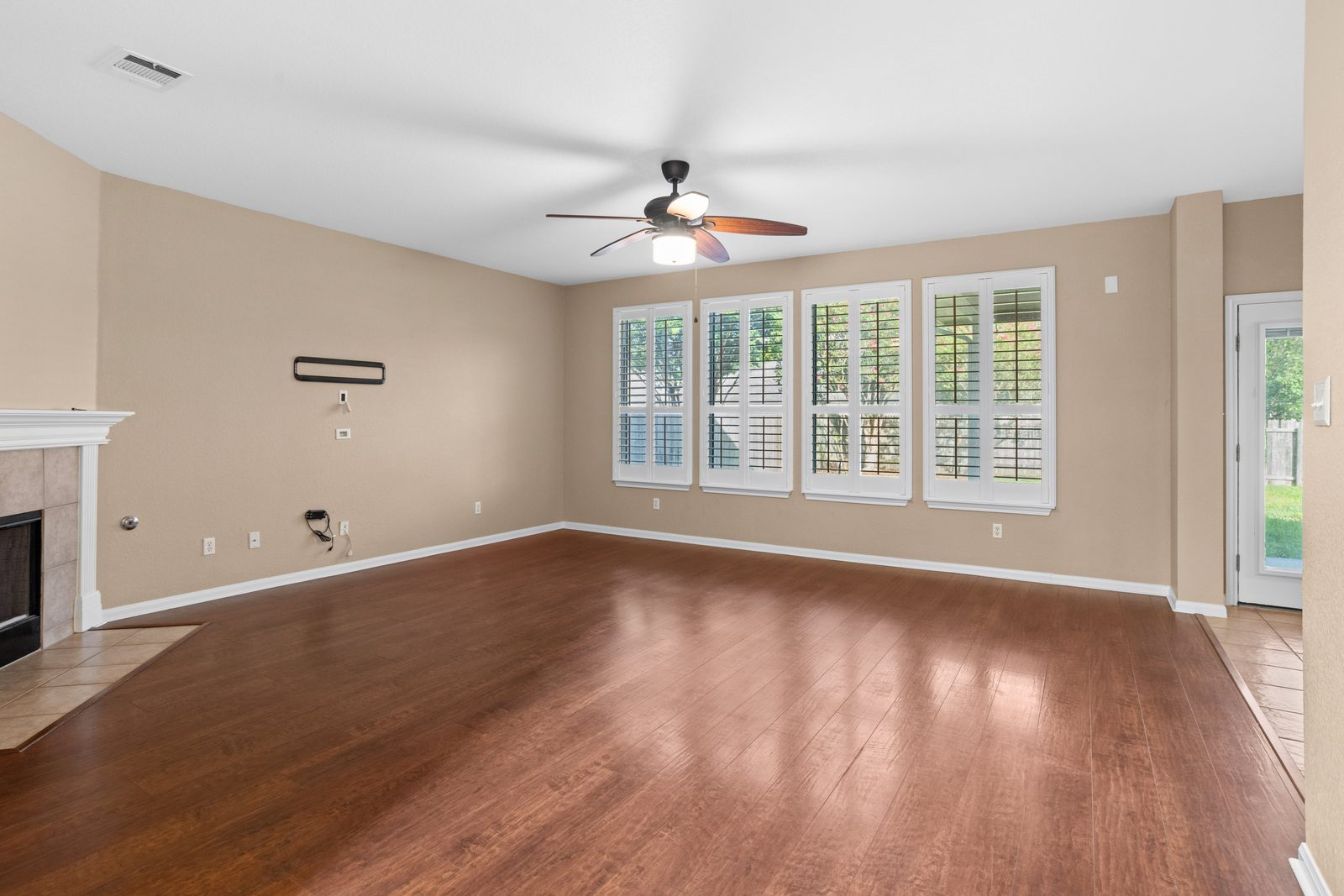 Living — vacant two-story home, Austin TX real estate photography