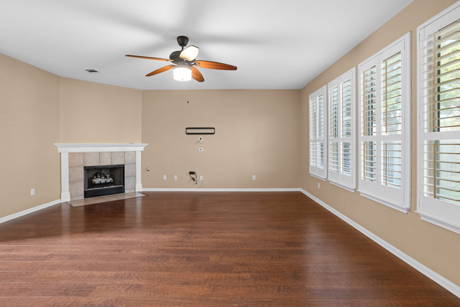 Living — vacant two-story home, Austin TX real estate photography
